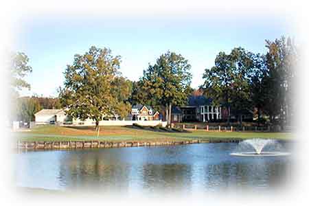 Golf course with pond and fountain